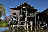 Inle Lake Myanmar. All the buildings are constructed on piles. Residents travel around by canoe, but there are also bamboo walkways and bridges over the canals, monasteries and stupas. 